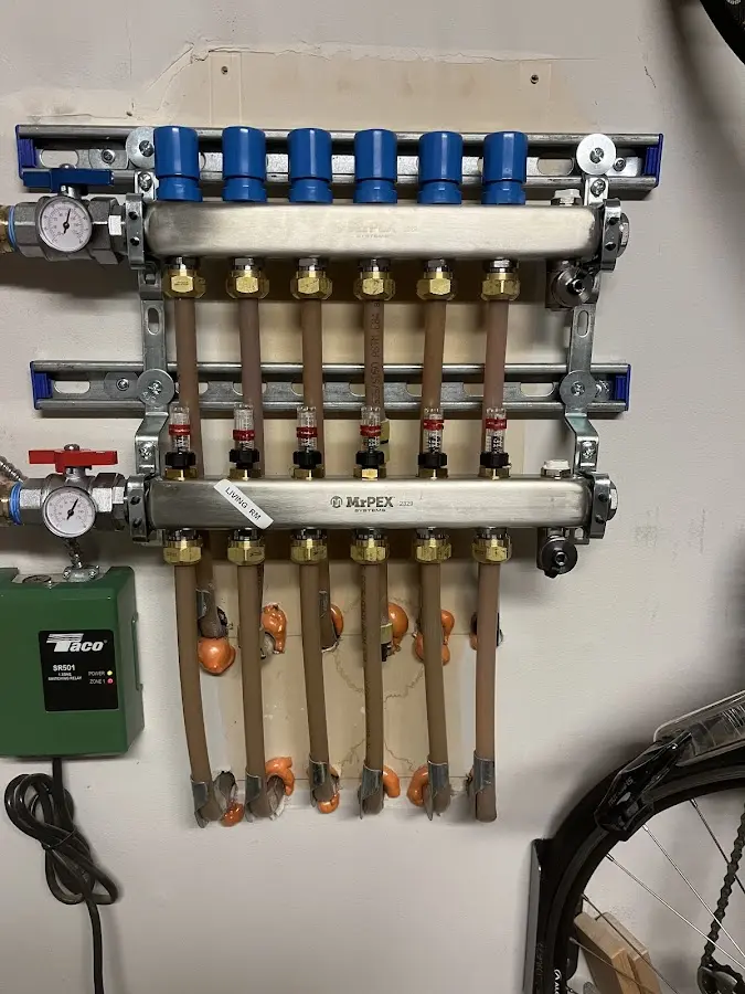 Plumber performing Gas Leak Detection at a residential property in Utica